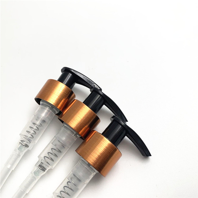 A bomba de alumínio escovada luxuosa da loção para o tonalizador cosmético desnata 24mm 28mm